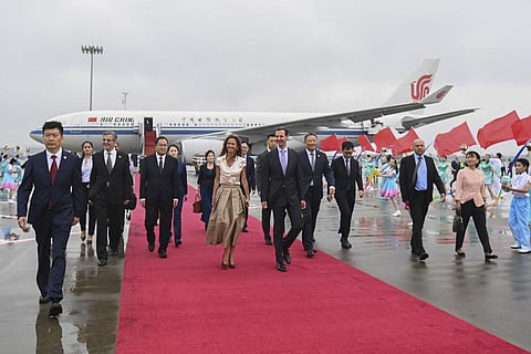 Syrian President Bashar Al-Assad, centre right, and first lady Asma Assad arrive in Hangzhou, China, Thursday, Sept. 21, 2023. (Photo | AP)