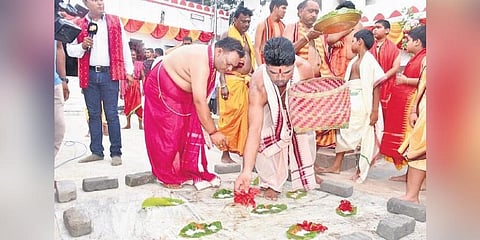 Priests performing Nuakhai rituals at Samaleswari temple on Wednesday | Express