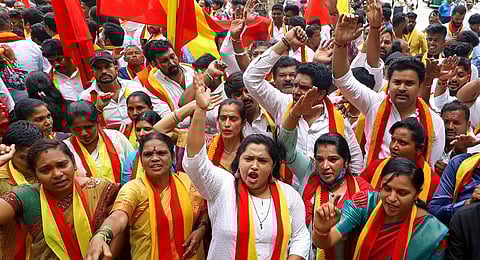 Members of Karnataka Rakshana Vedike raise slogans during a protest against Cauvery Water Management Authority (CWMA) over its decision to ensure a flow of 5,000 cusecs of river water to TN.(PTI)