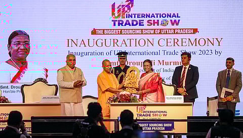 UP Chief Minister Yogi Adityanath greets President Droupadi Murmu during the inauguration of the UP International Trade Show 2023, in Greater Noida. (PTI)