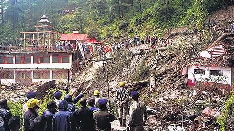 Police, district administration and locals carry out rescue operation after collapse of a temple following a massive landslide near Summer Hill in Shimla on Aug. 14. 2023 | PTI