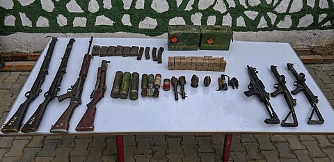 FILE: 35 weapons, warlike stores recovered during joint combing operations by security forces in ethnic violence-affected Manipur