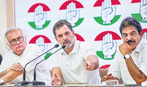 Congress leaders Rahul Gandhi, Jairam Ramesh and KC Venugopal address a press conference at AICC headquarters in New Delhi on Friday | PTI
