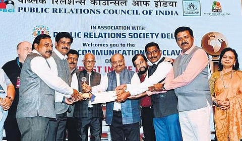 ​  KSRTC and BMTC representatives receive the awards at the 17th Global Communication Conclave in Delhi on Friday | Express  ​