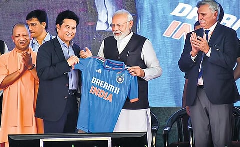 PM Narendra Modi with UP CM Yogi Adityanath, BCCI president Roger Binny and Sachin Tendulkar in Varanasi on Saturday| pti
