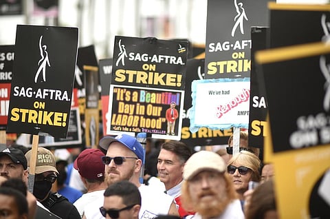 Picketers participate in a rally outside Paramount Pictures Studio on Wednesday, Sept. 13, 2023, in Los Angeles. (AP)
