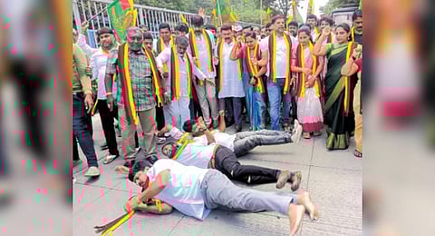 ​  Kannada activists perform urulu seve to protest the release of Cauvery water to Tamil Nadu in Bengaluru on Saturday | Express  .