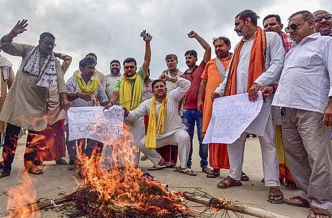 FILE: People burn an effigy during a protest against DMK leader Udhayanidhi Stalin for his comments against Sanatan Dharma, in Prayagraj on Sept. 5, 2023 | PTI