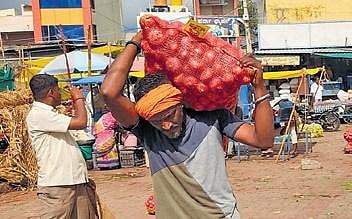 Wrestler Appasi Terdal working as a labourer at the market in Mudhol town of Bagalkot district | Express