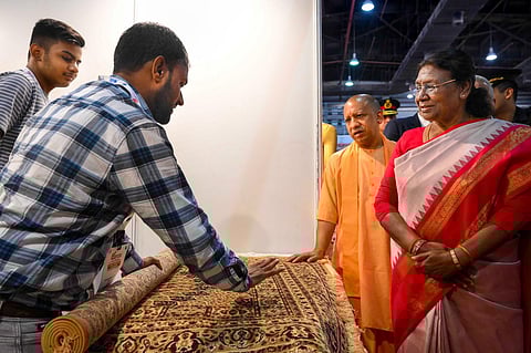 President Droupadi Murmu with Uttar Pradesh Chief Minister Yogi Adityanath during the inauguration of the Uttar Pradesh International Trade Show, in Greater Noida. (PTI)