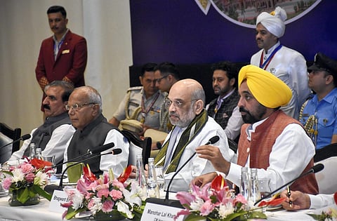 Amit Shah with Banwari Lal Purohit, Sukhvinder Singh Sukhu and Bhagwant Mann during the 31st Northern Zonal Council (NZC) meeting in Amritsar. (PTI)
