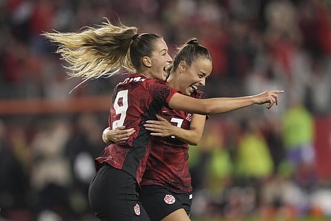 Canada's Jordyn Huitema (9) celebrates her goal with teammate Julia Grosso during the second half of a CONCACAF women's championship soccer series match against Jamaica. (Photo | AP)