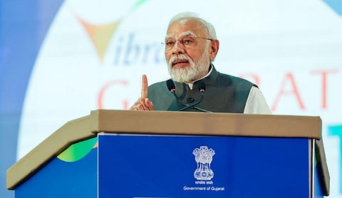 Prime Minister Narendra Modi addresses during a programme marking the celebration of 20 years of 'Vibrant Gujarat Global Summit', at Science City in Ahmedabad, Sept. 27, 2023. (Photo | PTI)