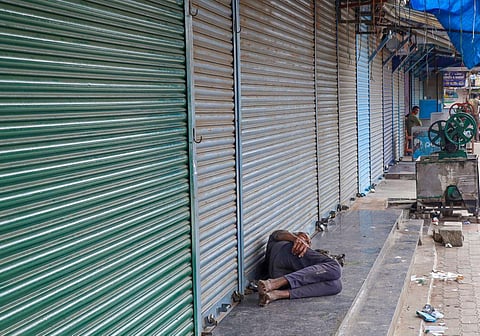 Closed shops in Bengaluru's KR Market during a 'bandh' called by farmers and Kannada organisations against the release of Cauvery river water to Tamil Nadu, Sept. 26, 2023. (Photo | PTI)