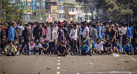 st: School students stage a protest rally against the killing of two Meitei youths by suspected Kuki Zo militants, at Moirangkhom in Imphal West. (Photo | PTI)