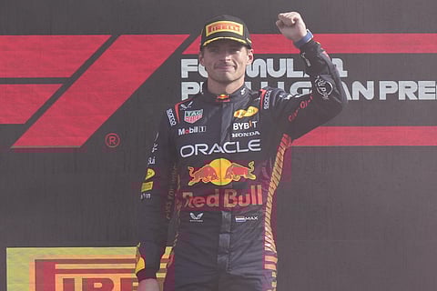 Red Bull driver Max Verstappen of the Netherlands celebrates on the podium after winning the Formula One Italian Grand Prix auto race, at the Monza racetrack. (Photo | AP)