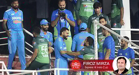 Pakistan and Indian players greet each other after the Asia Cup cricket match between India and Pakistan was called off due to rain. (Photo | PTI)