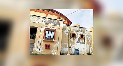 Paint peeling off from the walls of newly-constructed auditorium of GMU | Express