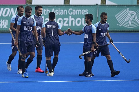 FILE - Indian players celebrate after scoring a goal during the preliminary men's Pool A hockey match against Singapore in the 19th Asian Games in Hangzhou, Sept. 26, 2023. (Photo | AP)