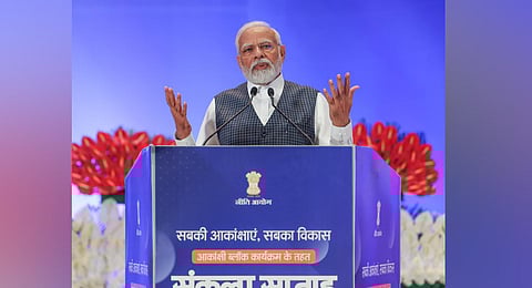 Minister Narendra Modi addresses during the launch of a week-long programme for Aspirational Blocks titled 'Sankalp Saptaah', at Bharat Mandapam. (Photo | PTI)