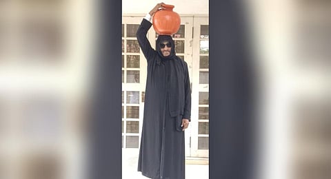 Vatal Nagaraj outside his Bengaluru residence wearing a burqa | Express
