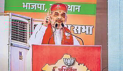 Union Home Minister Amit Shah speaking at the inauguration of ‘Parivartan Sankalp Yatra’, in Dungarpur on Sunday | PTI