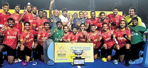 Udhayanidhi Stalin (C), TN sports minister, gives away the trophy to the winners.