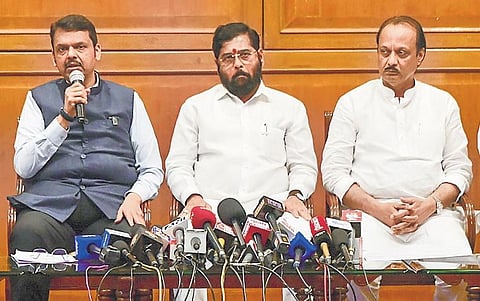 CM Eknath Shinde with Dy CMs Devendra Fadnavis and Ajit Pawar. The Opposition has demanded Fadnavis’ resignation over police action on Maratha protestors  | pti