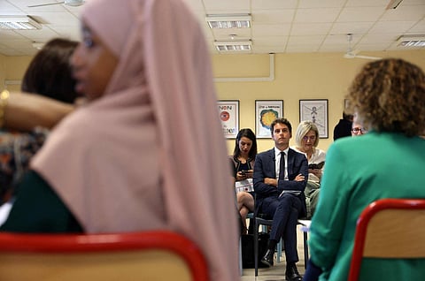 French students in headscarves. (Photo | AFP)