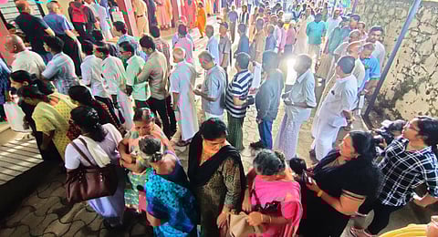 Voters lined up outside polling booths to cast their votes in Puthuppally by-election.(Photo | Express)