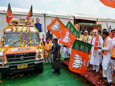 Union Home Minister Amit Shah with Madhya Pradesh CM Shivraj Singh Chouhan and others during the launch of the BJP's 'Jan Ashirwad Yatra', in Mandla district, Tuesday, Sept. 5, 2023. (Photo | PTI)