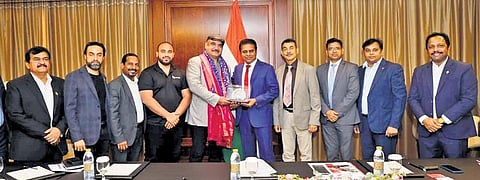 A delegation of Nafco Group meets State Industries Minister KT Rama Rao in Dubai on Tuesday. (Photo | Express)