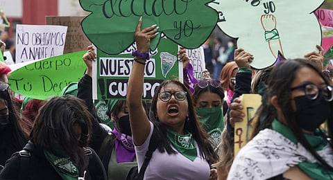 A woman holds up a sign with a message that reads in Spanish; 'I will decide' as she joins a march demanding legal, free and safe abortions in Mexico City.(File | AP)