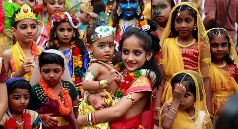 Children dressed up lord Krisha and Radha participating Shobhayathra as part of Shree Krishna Jayanthi Celebration in Kochi on Wednesday.(TP Sooraj, EPS)