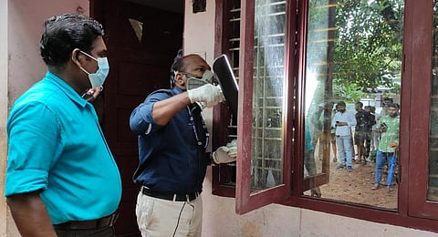 Investigators collecting evidence at the residence of the 8-year-old girl who was sexually assaulted at Chathanpuram near Aluva on Thursday.(Photo | Express)