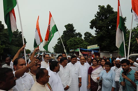 Odisha Pradesh Congress Committee members organising a Padayatra under the leadership on OPCC president  Sarat Patnaik in Bhubaneswar on Thursday (Photo | Shamim Qureshy, EPS)