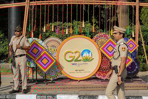 Police personnel outside Rajghat ahead of the G20 Summit, in New Delhi on Sunday. (Photo | PTI)