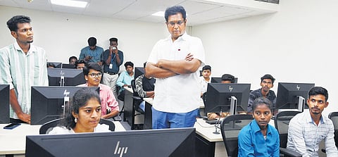 Minister for Industries TRB Rajaa interacting with students during a visit to three centres of excellence at Tidel Park in Taramani on Thursday | Shiba Prasad Sahu