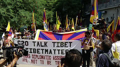 The Tibetan community demonstrating near Majnu Ka Tilla in north Delhi against the Chinese government on Friday (Photo | Express)
