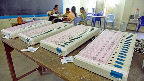 For representational purpose. Electronic Voting Machines inside a polling station. 