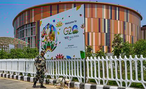A security personnel with a sniffer dog outside Pragati Maidan ahead of the G20 Summit, in New Delhi, Thursday, Sept. 7, 2023. (Photo | PTI)