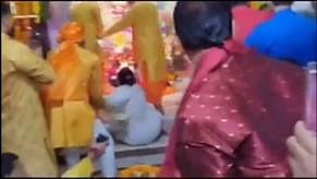Maharani Jiteshwari Devi being dragged away from the temple's sanctum sanctorum. (Photo | Screengrab @Twitter)