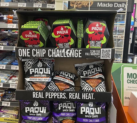Paqui One Chip Challenge chips are displayed at a 7-Eleven store in Boston, Sept 7, 2023.