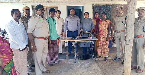 Nandyala District Forest Officer Vineet Kumar and others distributing sewing machines to Chenchu tribes.