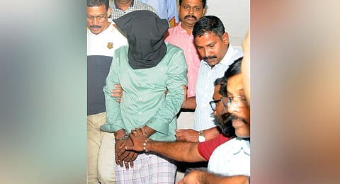 Savad, who chopped the right hand of Professor TJ Jospeh in 2010, was arrested by NIA from Mattannur in Kannur and being produced at a court in Kochi on Wednesday.(Express)