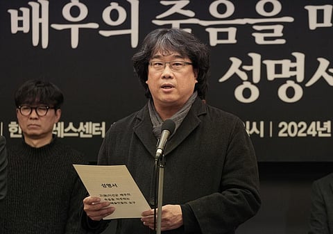 South Korean director Bong Joon-ho speaks during a press conference demanding an investigation into the case for the death of the late actor Lee Sun-kyun in Seoul, South Korea. (Photo | AP)