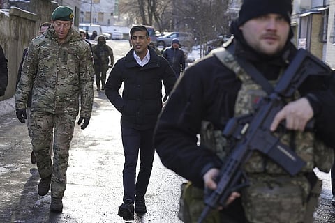 British PM Rishi Sunak and Vice Chief of the Defence Staff, Major General Gwyn Jenkins (L), are shown damaged buildings in Kyiv, Ukraine, Friday, Jan. 12, 2024. (Photo | AP)