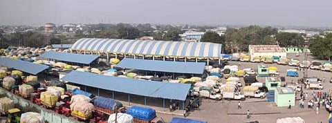 Farmers line up their vehicles to weigh their cotton products in Adilabad.