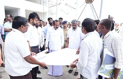 TN Minister S Muthusamy inspected the construction work of the new Erode bus stand.