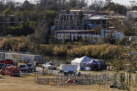 Texas Department of Public Safety officers work inside a fenced off Shelby Park, Thursday, January 11, 2024. (Photo | AP)